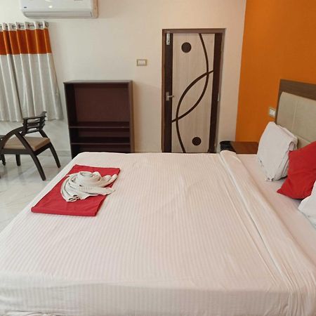 Hotel O Happy Grand Hotel Gunadala Bagian luar foto